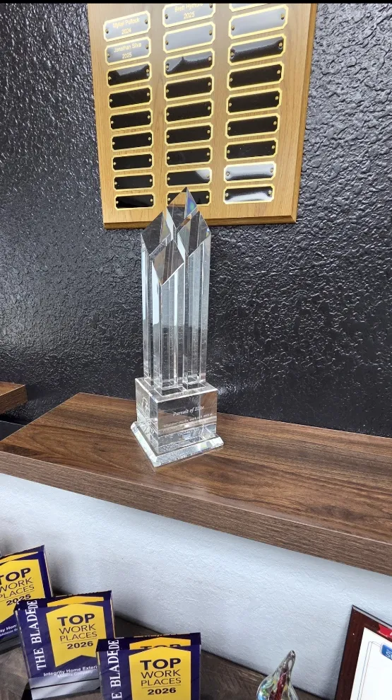 Integrity Home Exteriors Pursuit of Elite award trophy